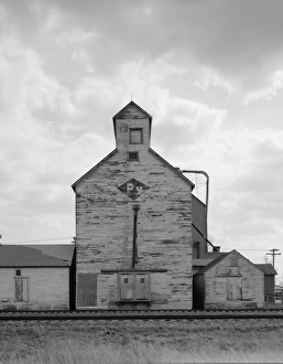 Rural America Photographs Prints: GRAIN ELEVATORS, 1990. A grain elevator in Chokio, Minnesota. Photograph, 1990