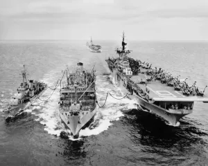 Prints of KOREAN WAR: SHIP REFUELING. The destroyer USS Shelton and the aircraft carrier USS Antietam refueling from the tanker USS Tolovana in Korean waters Essex Prints: Korean War Print: USS Tolovana Refueling USS Antietam