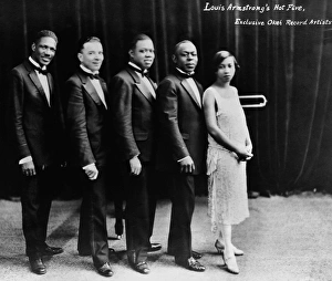 LOUIS ARMSTRONG (1900-1971). American musician. Louis Armstrongs band, the Hot Five. Photograph, c1926 LOUIS ARMSTRONG (1900-1971). American musician. Louis Armstrongs band, the Hot Five. Photograph, c1926