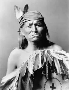 Vintage Native American Art Prints: APACHE MAN, c1903. Portrait of an Apache man. Photograph by Edward Curtis, c1903