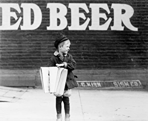NEWSBOY, 1910. Photographed c1910 at an unknown location, probably in the Northeastern NEWSBOY, 1910. Photographed c1910 at an unknown location, probably in the Northeastern