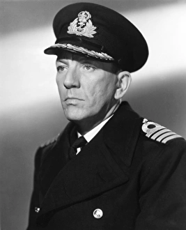 NOEL COWARD (1899-1973). English actor and playwright. Coward as the naval captain in In NOEL COWARD (1899-1973). English actor and playwright. Coward as the naval captain in In