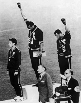 Pop art Collection: OLYMPIC GAMES, 1968. American runners Tommie Smith (center) and John Carlos (right)