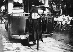 PARIS: OMNIBUS, c1920. A woman boards an omnibus in Paris, France. Photograph, c1920 PARIS: OMNIBUS, c1920. A woman boards an omnibus in Paris, France. Photograph, c1920