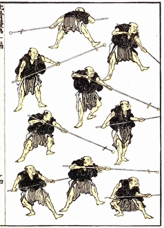 The practice spears bear padded tips and each samurai has tucked up his kimono The practice spears bear padded tips and each samurai has tucked up his kimono