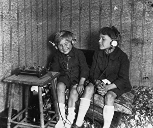 RADIO, c1920. Two boys listening to a radio with headphones. Photograph, c1920 RADIO, c1920. Two boys listening to a radio with headphones. Photograph, c1920