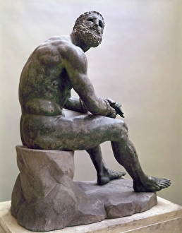 ROME: BOXER SCULPTURE. The Boxer of Quirinal, a Hellenistic Greek sculpture of a seated boxer ROME: BOXER SCULPTURE. The Boxer of Quirinal, a Hellenistic Greek sculpture of a seated boxer