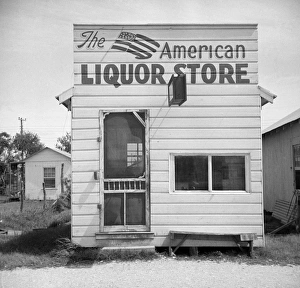 TEXAS: LIQUOR STORE. View of a liquor store in Palacios, Texas. Photograph by John Vachon TEXAS: LIQUOR STORE. View of a liquor store in Palacios, Texas. Photograph by John Vachon