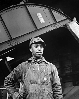 WATTS BAR DAM, 1942. Earl M. Qualls, a car dumper operator employed by the Tennessee WATTS BAR DAM, 1942. Earl M. Qualls, a car dumper operator employed by the Tennessee