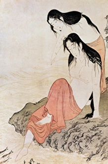 Two women abalone divers preparing for their next dive. Woodblock print by Kitagawa Two women abalone divers preparing for their next dive. Woodblock print by Kitagawa