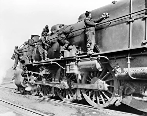 Women engine cleaners on the Pennsylvania Railroad, taking the place of men fighting in Women engine cleaners on the Pennsylvania Railroad, taking the place of men fighting in