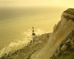Prints of Looking down on the lighthouse at Beachy Head on the south coast near Eastbourne Sussex Beachy Head Prints: Beachy Head Lighthouse Print