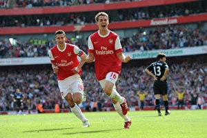 Aaron Ramsey celebrates scoring Arsenals goal with Robin van Persie Aaron Ramsey celebrates scoring Arsenals goal with Robin van Persie
