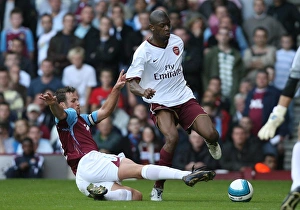 Abou Diaby (Arsenal) Lucas Neill (West Ham) Abou Diaby (Arsenal) Lucas Neill (West Ham)