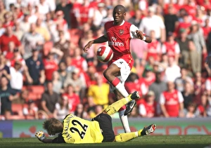 Abu Diaby (Arsneal) Jussi Jaskelainen (Bolton) Abu Diaby (Arsneal) Jussi Jaskelainen (Bolton)
