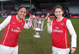 Alex Scott and Karen Carney (Arsenal) with the League Cup Trophy Alex Scott and Karen Carney (Arsenal) with the League Cup Trophy