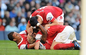 Alex Song celebrates scoring the 2nd Arsenal goal Marouane Chamakh, Sami Nasri Alex Song celebrates scoring the 2nd Arsenal goal Marouane Chamakh, Sami Nasri