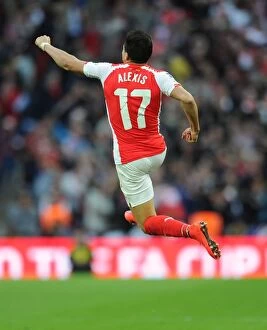 Images Dated 18th April 2015: Alexis Sanchez's Brace: Arsenal Advance to FA Cup Final vs. Aston Villa