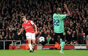 Andrey Arshavin scores Arsenals 2nd goal under pressure from Eric Abidal (Barcelona) Andrey Arshavin scores Arsenals 2nd goal under pressure from Eric Abidal (Barcelona)