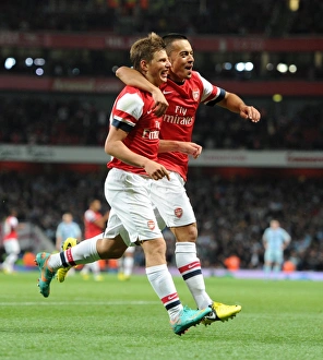 Andrey Arshvin celebrates scoring Arsenals 3rd goal with Nico Yennaris Andrey Arshvin celebrates scoring Arsenals 3rd goal with Nico Yennaris