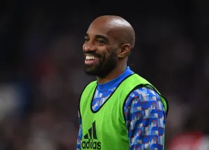 Arsenal FC Print: Lacazette's Playful Moment with Fans