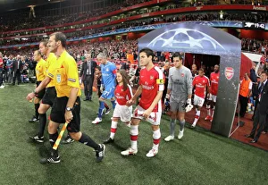 Arsenal captain Cesc Fabregas leads out the team before the match Arsenal captain Cesc Fabregas leads out the team before the match