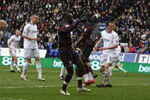 Arsenal captain William Gallas shoots past Bolton goalkeeper Ali Al Hasbi to score Arsenal captain William Gallas shoots past Bolton goalkeeper Ali Al Hasbi to score