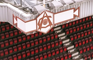 Arsenal Crest and seats, photographed from the North Bank Arsenal Crest and seats, photographed from the North Bank
