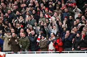 Images Dated 27th December 2009: Arsenal fans celebrate the 1st goal. Arsenal 3: 0 Aston Villa. Barclays Premier League