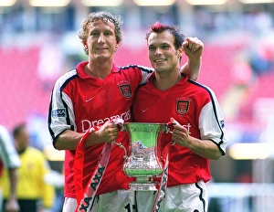 Arsenal goalscorers Ray Parlour and Fredrik Ljungberg with the F.A Arsenal goalscorers Ray Parlour and Fredrik Ljungberg with the F.A