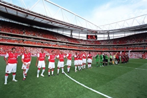 The Arsenal Legends and Ajax Legends line up before the match The Arsenal Legends and Ajax Legends line up before the match