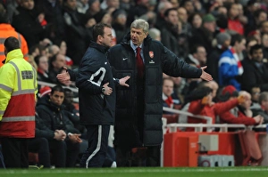 Arsenal manager Arsene Wenger with the 4th official. Arsenal 2:1 Everton Arsenal manager Arsene Wenger with the 4th official. Arsenal 2:1 Everton