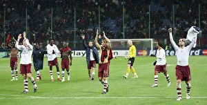 Arsenal players celebrate after the match Arsenal players celebrate after the match