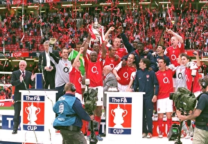The Arsenal Players celebrate winning the FA Cup Trophy The Arsenal Players celebrate winning the FA Cup Trophy