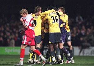 The Arsenal players celebrate winning the penalty shoot out The Arsenal players celebrate winning the penalty shoot out