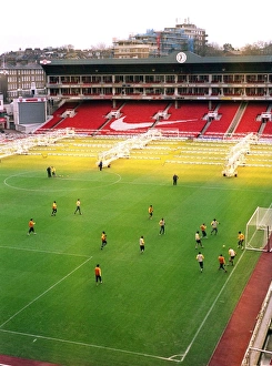 The Arsenal team train on the pitch at Highbury The Arsenal team train on the pitch at Highbury