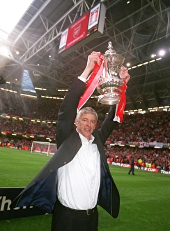 Arsene Wenger the Arsenal Manager with the FA Cup Trophy Arsene Wenger the Arsenal Manager with the FA Cup Trophy