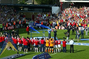 Arsene Wenger the Arsenal Manager lifts the Premiership Trophy Arsene Wenger the Arsenal Manager lifts the Premiership Trophy