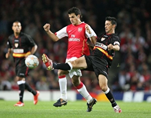 Cesc Fabregas (Arsenal) Jose Luis Marti (Sevilla) Cesc Fabregas (Arsenal) Jose Luis Marti (Sevilla)