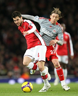 Cesc Fabregas (Arsenal) Leiva Lucas (Liverpool) Cesc Fabregas (Arsenal) Leiva Lucas (Liverpool)