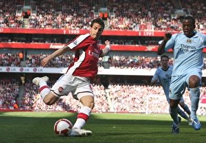 Cesc Fabregas (Arsenal) Nedum Onuoha (Man City) Cesc Fabregas (Arsenal) Nedum Onuoha (Man City)