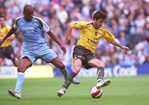 Cesc Fabregas (Arsenal) Sylvain Distin (Man City) Cesc Fabregas (Arsenal) Sylvain Distin (Man City)