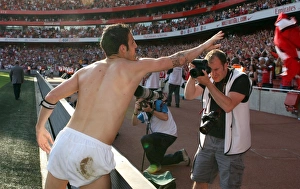 Cesc Fabregas (Arsenal) throws his shrt to the fans after the match Cesc Fabregas (Arsenal) throws his shrt to the fans after the match