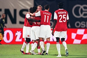 Cesc Fabregas celebrates scorong the 3rd Arsenal goal with Alex Hleb Cesc Fabregas celebrates scorong the 3rd Arsenal goal with Alex Hleb