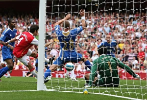 Cesc Fabregas scores Arsenals 2nd goal past David James (Portsmouth) Cesc Fabregas scores Arsenals 2nd goal past David James (Portsmouth)