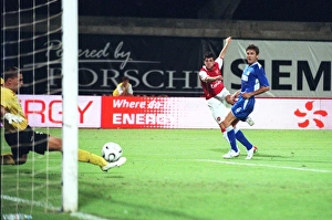 Cesc Fabregas shoots past Zagreb goalkeeper Ivan Turina to score the 1st Arsenal goal Cesc Fabregas shoots past Zagreb goalkeeper Ivan Turina to score the 1st Arsenal goal