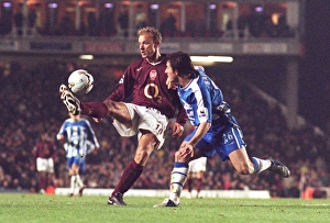 Dennis Bergkamp (Arsenal) Leighton Baines (Wigan). Arsenal 2:1 Wigan Athletic Dennis Bergkamp (Arsenal) Leighton Baines (Wigan). Arsenal 2:1 Wigan Athletic