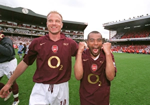 Dennis Bergkamp and Ashley Cole (Arsenal) celebrate at the end of the match Dennis Bergkamp and Ashley Cole (Arsenal) celebrate at the end of the match