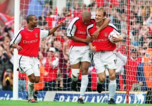 Dennis Bergkamp celebrates scoring the 1st Arsenal goal with Thierry Henry Dennis Bergkamp celebrates scoring the 1st Arsenal goal with Thierry Henry