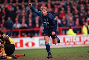 Dennis Bergkamp celebrates scoring for Arsenal against Nottingham Forest Dennis Bergkamp celebrates scoring for Arsenal against Nottingham Forest